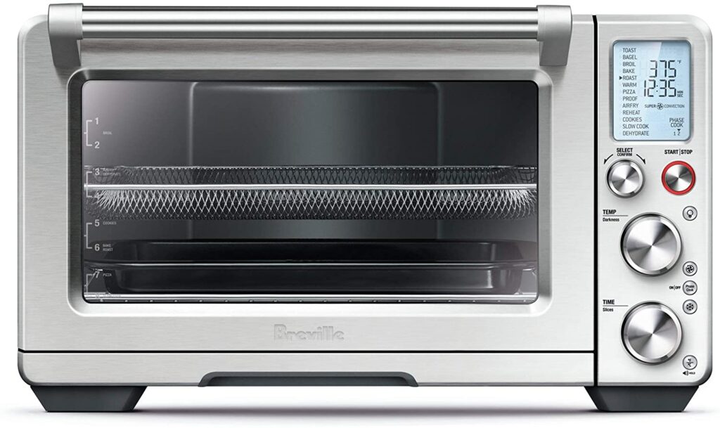 Breville Smart Oven Air Fryer Pro (BOV900BSS) with a stainless steel finish, digital display, and various cooking functions