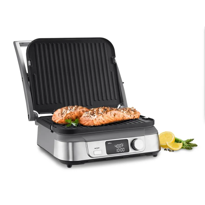 A side-by-side comparison of a small, portable grill cooking a few burgers and a large family-sized grill loaded with various foods like steaks, vegetables, and hot dogs.