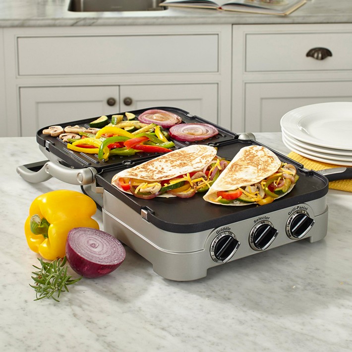 Cuisinart Griddler Deluxe with open lid, showcasing reversible grill and griddle plates.