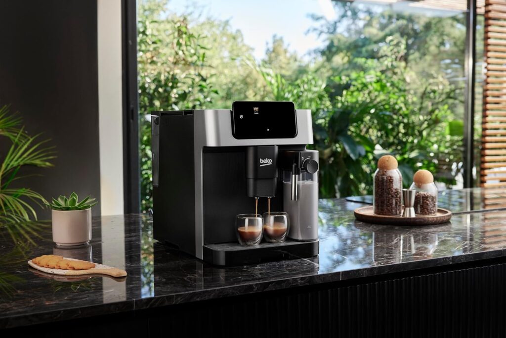 Bean-to-cup coffee machine with a built-in grinder, sleek black and silver design, and an automatic milk frother, offering fresh coffee brewing and customizable drink options.